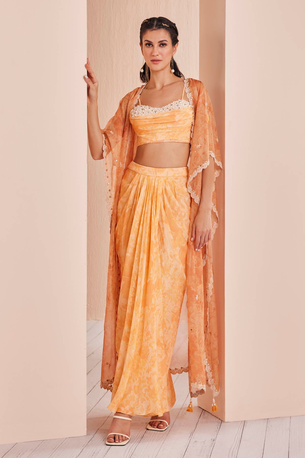Buy Orange Daisy Embroidered Lehenga Set by Mandira Wirk